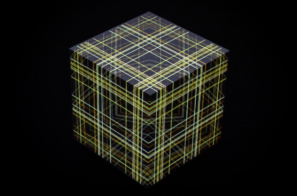 vVvoxel questions the fragility of our system of perception, and our relationship to real and virtual, via sensory experiences which confuse common sense of our senses. With video projection, the anatomy of the cube used in oqpo_oooo is being reinvented, allowing forms which were only presumed to become visible.